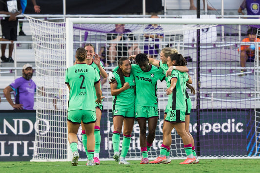 Barbara Olivieri celebrates with teammates after scoring against the Orlando Pride