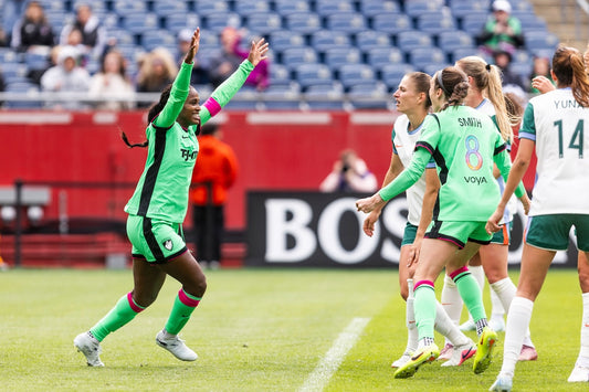 Nichelle Prince celebrates after scoring against the Denver Summit