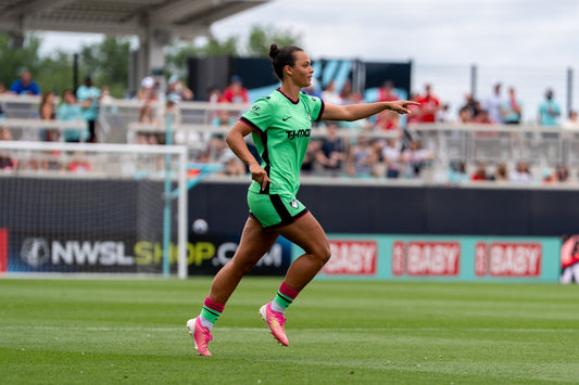 Sophia Lowenberg points during a game against Kansas City