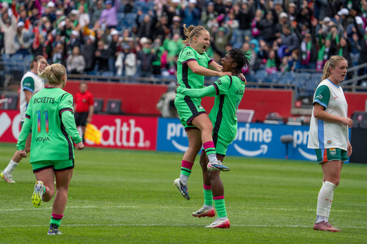 Boston Legacy forward Aissata Traore celebrates with midfielder Josefine Hasbo after scoring against the Denver Summit